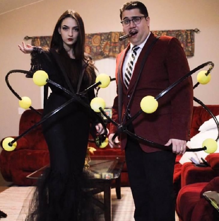 Hilarious and clever Halloween costumes based on puns and word play, The Atoms Family