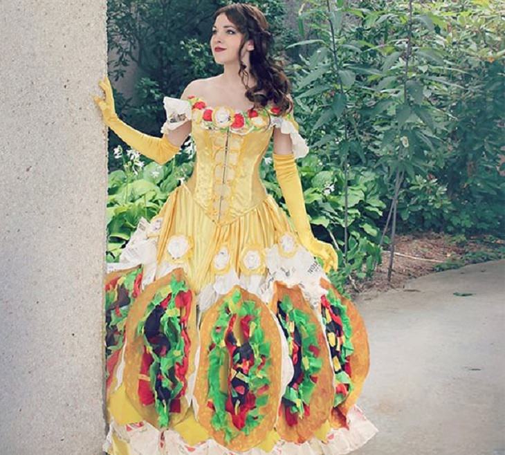 Hilarious and clever Halloween costumes based on puns and word play, Woman in Belle’s dress covered in tacos from Beauty and the Beast