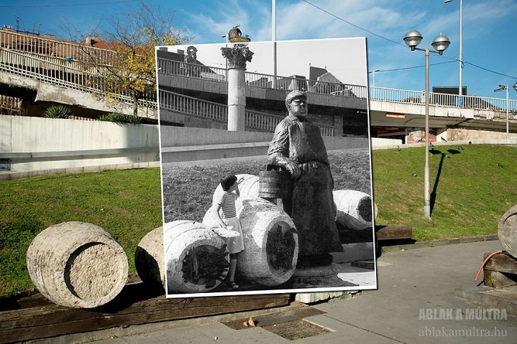 Photo Series titled “Ablak a múltra”, or “Window to the Past” by Hungarian Photographer Zoltán Kerényi, displaying from archived photographs of 20th century Budapest in the same location in the 21st century, Sculpture of man with wine barrels at Boráros Square, 1983 - 2015