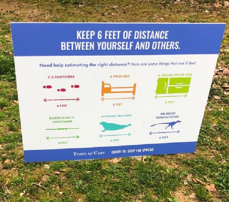 Funny signs related to the quarantine and lockdown caused by the COVID-19 (coronavirus) pandemic, town with a colorful sign describing 6 feet in different funny terms of measurement