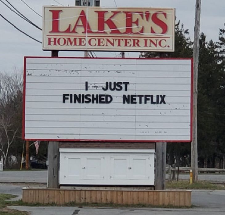 Funny signs related to the quarantine and lockdown caused by the COVID-19 (coronavirus) pandemic, large sign for Lake’s homecenter inc., saying “I just finished Netflix.”