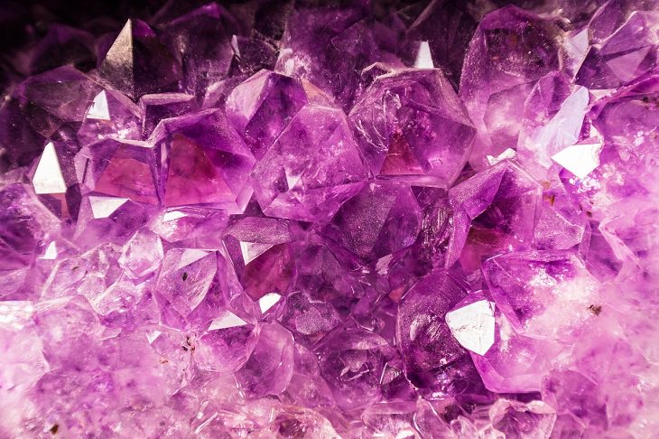 Meanings and symbolism of various colors in different countries and cultures, group of purple gems and rocks, purple