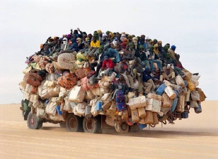 Hilarious photos showing things that can happen only in Africa, Truck crowded with people, and water cans