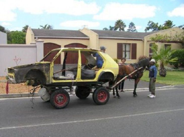 Hilarious photos showing things that can happen only in Africa, Broken down and stripped car being pulled by a horse
