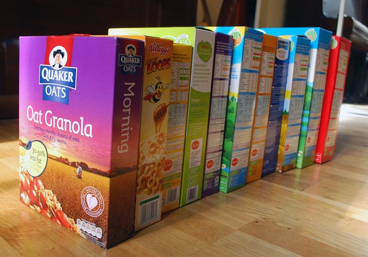 Downsizing and labelling marketing ploys done to trick Customers by big companies, Boxes of cereal boxes lined up