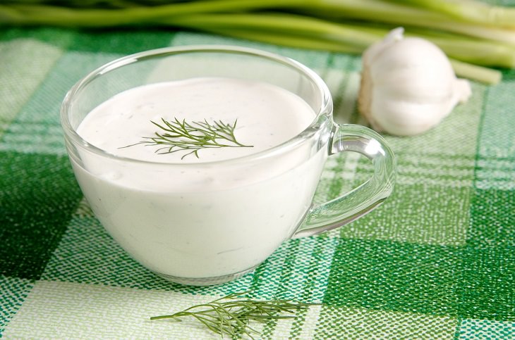 Best food sources for Vitamin K2, Transparent cup of cream