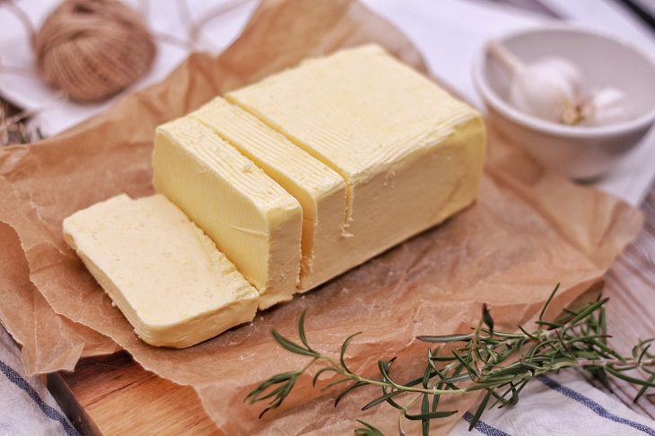 Best food sources for Vitamin K2, Semi-sliced butter in a foil