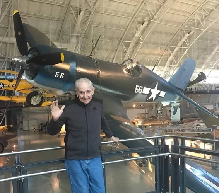 Incredible things done by seniors, Old man in front of black plane he flew in World War II