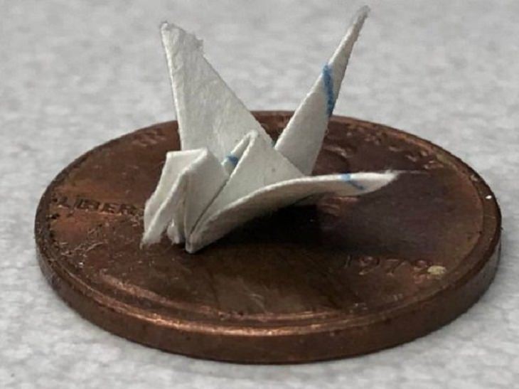 Incredibly tiny, small, and miniature everyday items and animals, Tiny paper crane on a penny
