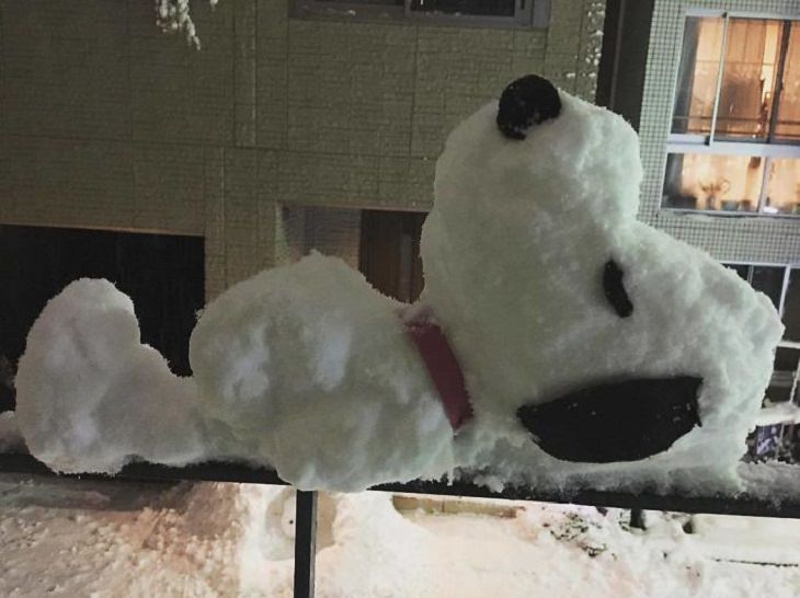 Residents of Tokyo create creative and unique snowmen and ice sculptures, Snow sculpture of Snoopy