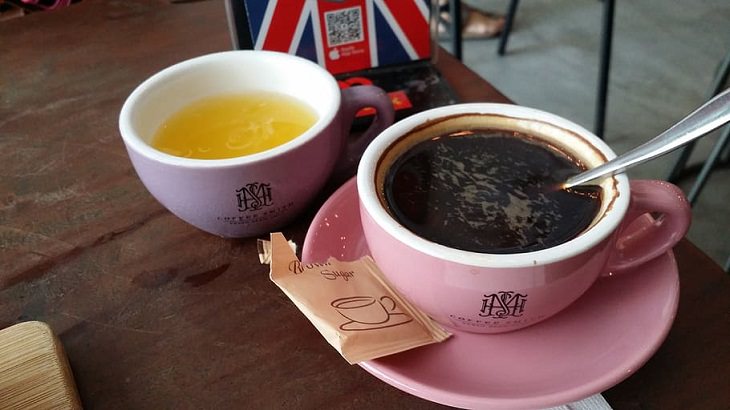Drinks healthy to have while fasting, Cup of coffee and cup of tea on a table