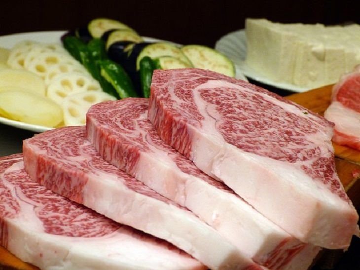 Household uses for old and used teabags, 4 raw steaks stacked on a table