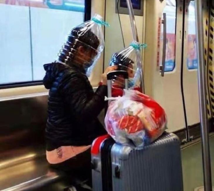 Hilarious photos of strange masks spotted on the subway, Mother and daughter wearing water cans on their heads