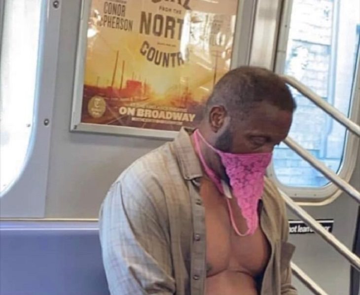 Hilarious photos of strange masks spotted on the subway, Man on the subway with open shirt and woman’s panties as a mask