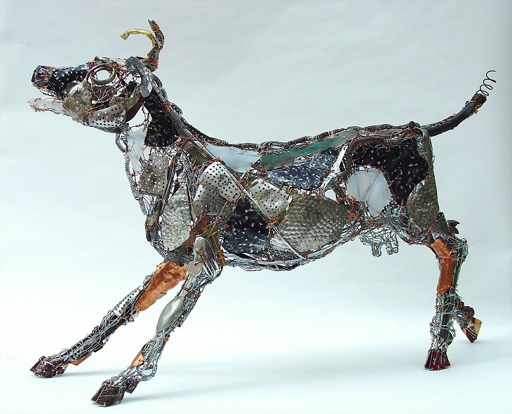 Beautiful animal sculptures made out of recycled scrap metal by Barbara Franc, Cow with the Crumpled Horn II