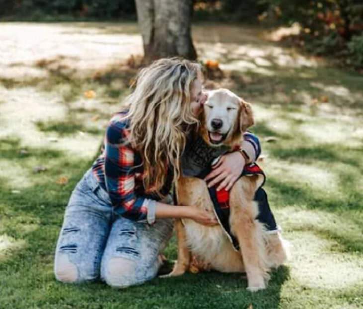 Photographs of smiling dogs, Woman hugging her smiling golden retriever