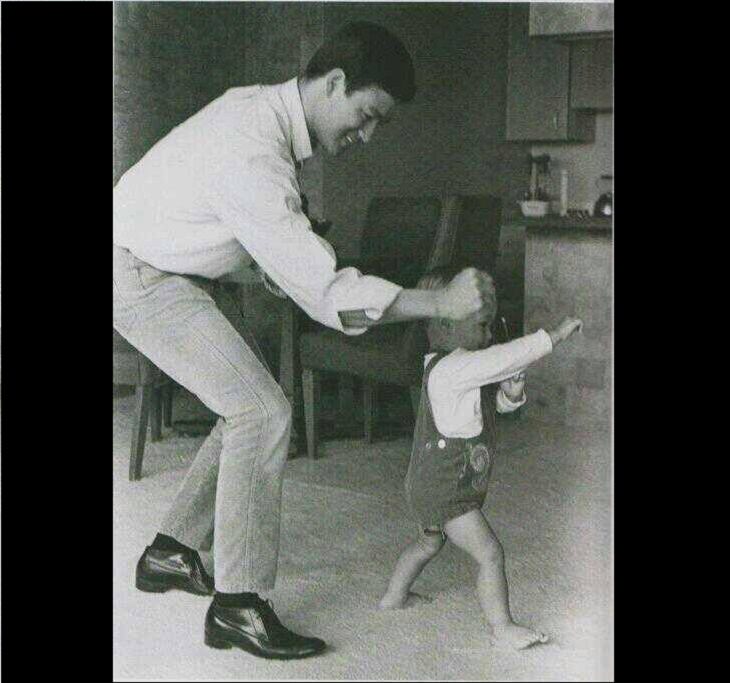 Historical photographs, Bruce Lee playing with his son Brandon, 1966