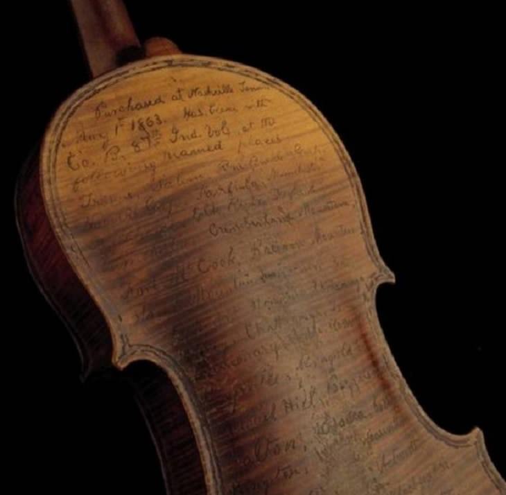 Historical photographs, A violin used as a war diary by Civil War soldier Solomon Conn, 1863