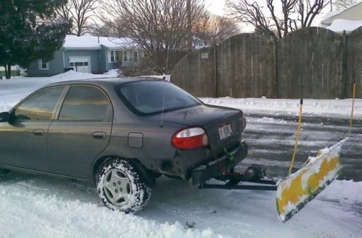 Makeshift, unique, and creative snowplows, car with snowplow attached to the back