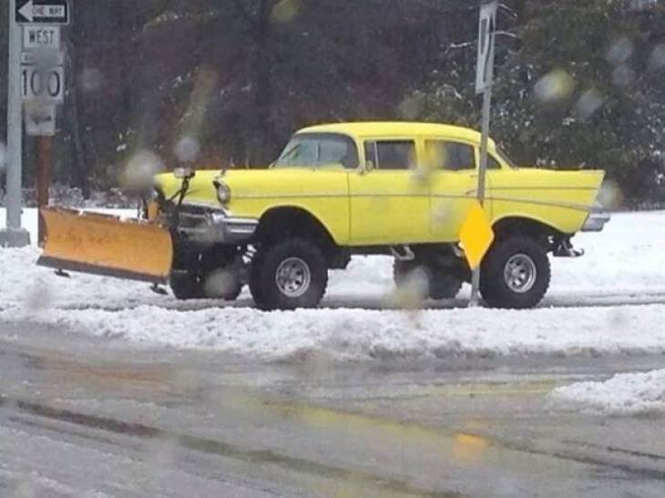 Makeshift, unique, and creative snowplows, yellow car with snowplow attached to the front