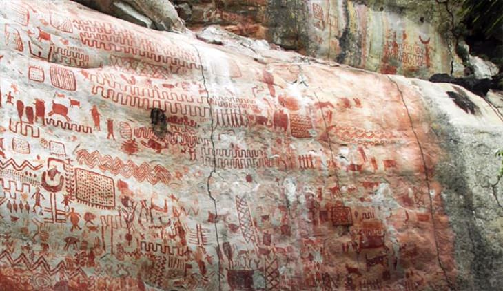 Photographs of cave paintings and rock art on 8 mile cliff in Western Amazon Rainforest called the Sistine Chapel of the Ancients