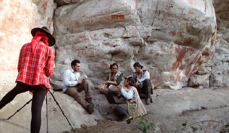 Photographs of cave paintings and rock art on 8 mile cliff in Western Amazon Rainforest called the Sistine Chapel of the Ancients 