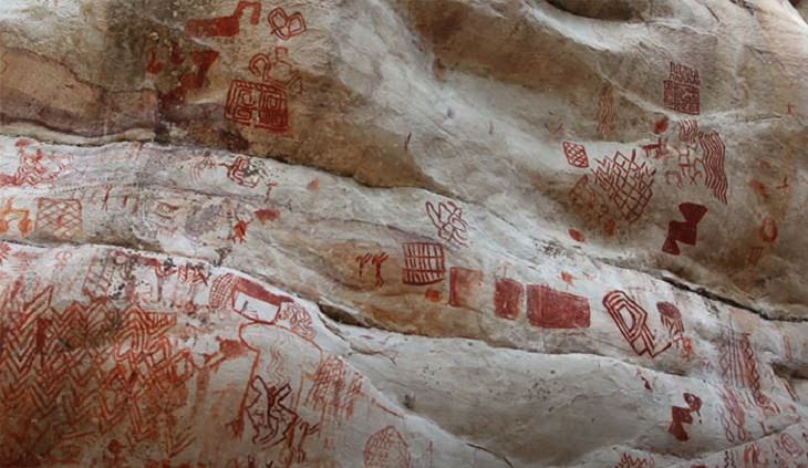 Photographs of cave paintings and rock art on 8 mile cliff in Western Amazon Rainforest called the Sistine Chapel of the Ancients 