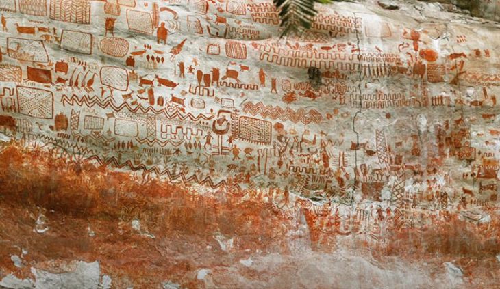 Photographs of cave paintings and rock art on 8 mile cliff in Western Amazon Rainforest called the Sistine Chapel of the Ancients 