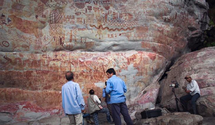 Photographs of cave paintings and rock art on 8 mile cliff in Western Amazon Rainforest called the Sistine Chapel of the Ancients 