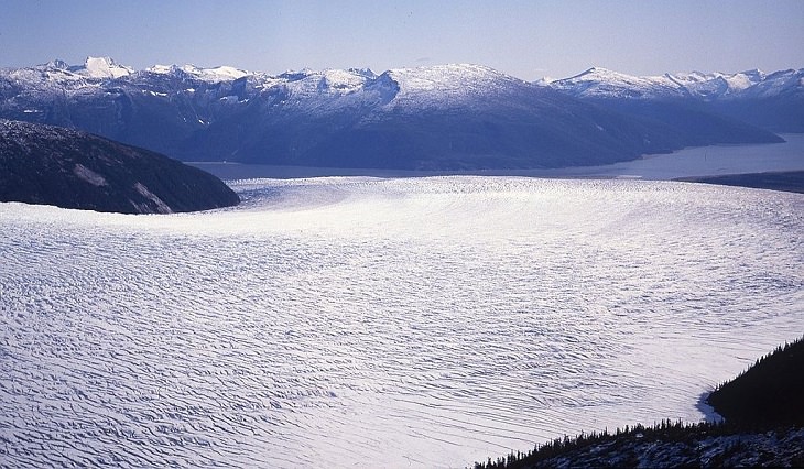 Different types of beautiful glaciers found all across Alaska, U.S.A, Taku Glacier, a tidewater glacier located in Taku Inlet, south east of Juneau, Alaska