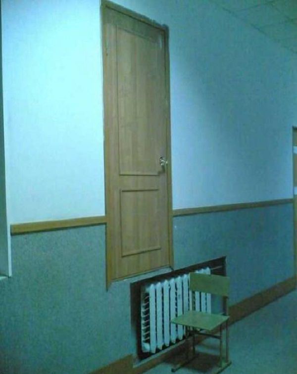 Strange, odd and weird things only found in Russia, door built high on the wall with a stair to climb up