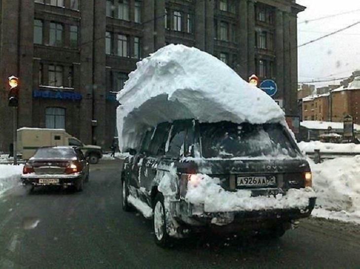 Strange, odd and weird things only found in Russia, car driving with giant chunk of ice attached to the roof