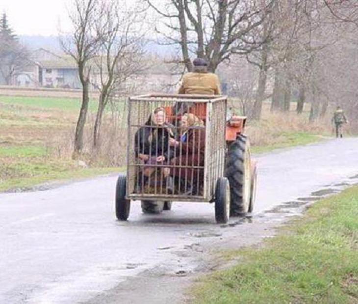 Strange, odd and weird things only found in Russia, children in a cage on the back of a truck