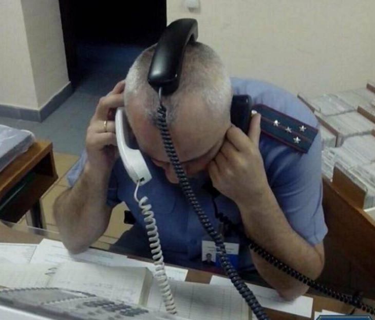 Strange, odd and weird things only found in Russia, man with multiple phones on his head and near his ears