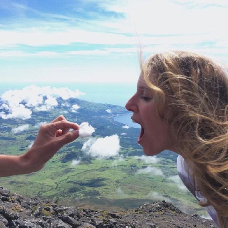 Incredible optical illusions created by Artist and photographer from Portugal Tiago Silva, eating a piece of cloud