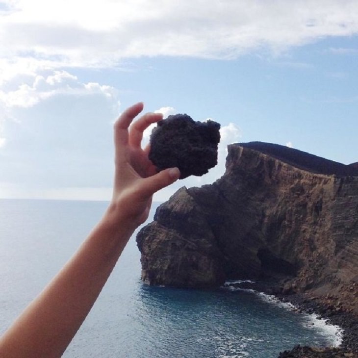 Incredible optical illusions created by Artist and photographer from Portugal Tiago Silva, A rock perfectly fitting the shape of a cliff