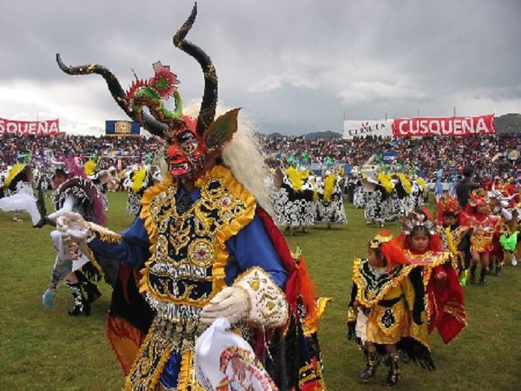 Sights, ruins, and things to see at Lake Titicaca on the Peru Bolivia border, The Devil of Puno Dance, practiced during the Festival de la Candelaria in Peru, in early February every year