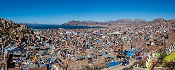 Sights, ruins, and things to see at Lake Titicaca on the Peru Bolivia border, view of Lake Titicaca from Puno, city in Peru