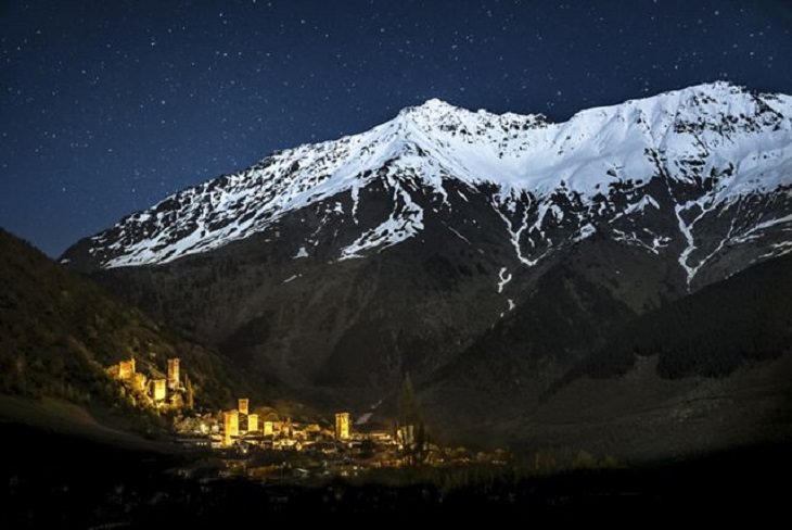 Winners of the Nature Conservancy World wide Photo Competition / Contest, Cities and Nature, Second Place: Yevhen Samuchenko, Ukraine GOLD OF SVANETI Mestia, a small city in the Svaneti Province of Georgia, as seen at night