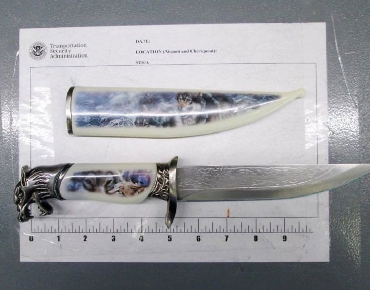 Crazy, odd, weird and strange items confiscated by Customs and TSA agents at airports during security checks, knife with a multicolor sheath