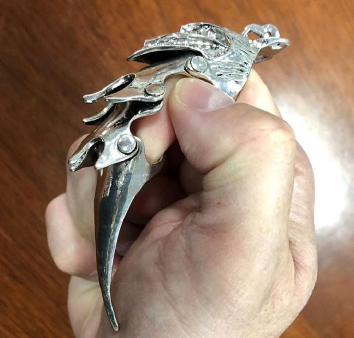 Crazy, odd, weird and strange items confiscated by Customs and TSA agents at airports during security checks, sharp metal claw hooked onto finger