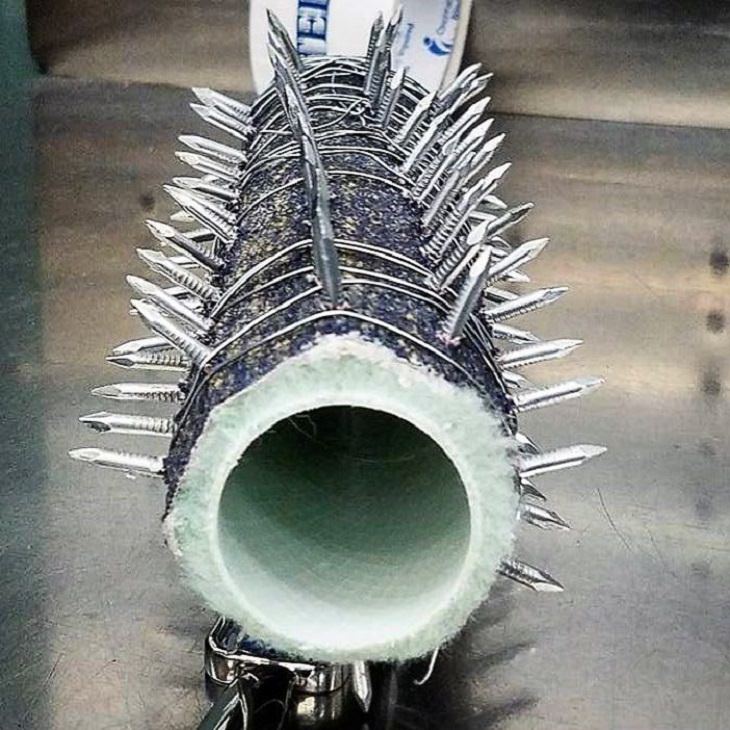 Crazy, odd, weird and strange items confiscated by Customs and TSA agents at airports during security checks, standard paint roller wrapped in sandpaper and wired with nails