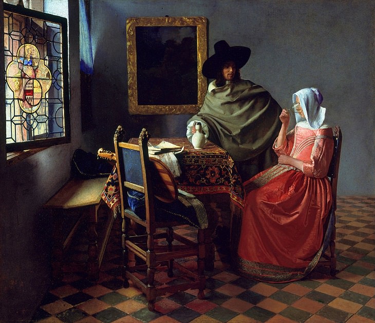 Beautiful lesser known paintings by golden age Dutch artist Johannes Vermeer, The Wine Glass, also known as A Lady Drinking and a Gentleman, now in the Gemäldegalerie, Berlin