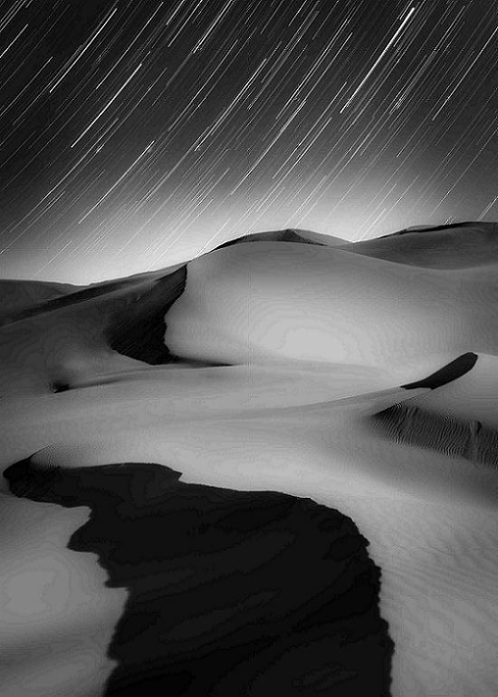 Photographs awarded Winner, Runner Up and Highly Commended in the Insight Investment Astronomy Photographer of the Year Competition 2019 organized by the Royal Observatory Greenwich, Joint Winner, Sir Patrick Moore Prize for Best Newcomer, Sky and Ground, Stars and Sand, by Shuchang Dong