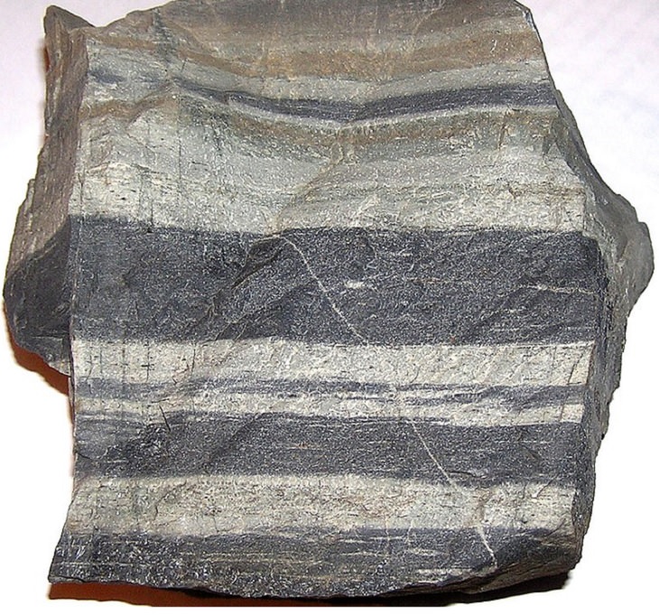 Normal or ordinary sedimentary, igneous and metamorphic rocks with beautiful patterns and colors, Banded Hornfels, used in Northern England as whetstones, for sharpening tools