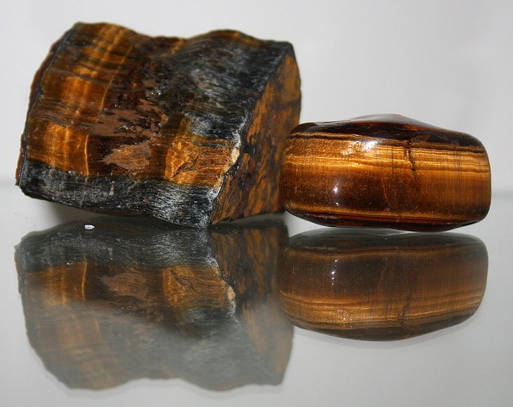 Normal or ordinary sedimentary, igneous and metamorphic rocks with beautiful patterns and colors, Tiger’s Eye, a metamorphic rock used commonly as a cats-eye gemstone