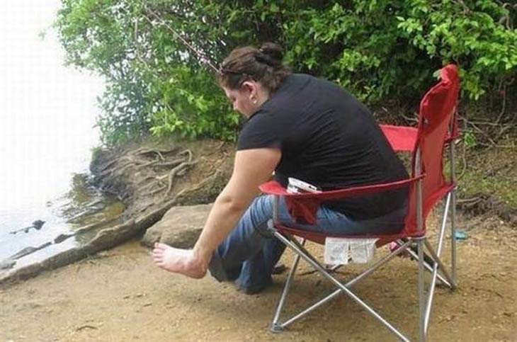 Photographs and pictures of interesting natural phenomenon or well-timed moments that will make you look twice, woman leaning down such that her arm ended with her foot