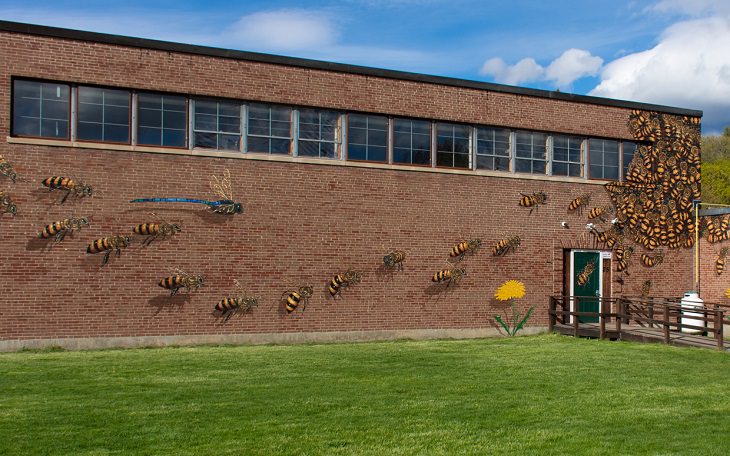 The best and most beautiful street art murals in all states across the United States of America, that send messages of culture, history and community, New Hampshire, Peterborough, The Good of the Hive, by Matthew Willey