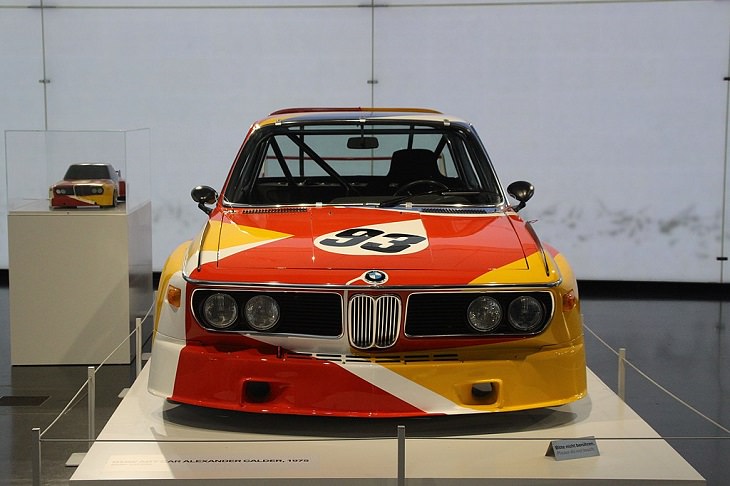Famous sculptures and works of art from 20th Century American artist and sculptor, Alexander Calder, The BMW 3.0 CSL (1975), painted and designed in Calder’s signature South American theme