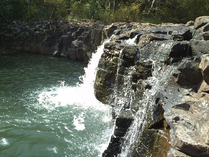 The beautiful sights and tourist activities in the Mondul Kiri (Mondulkiri) province of Cambodia, A waterfall on the route to the region of Busra